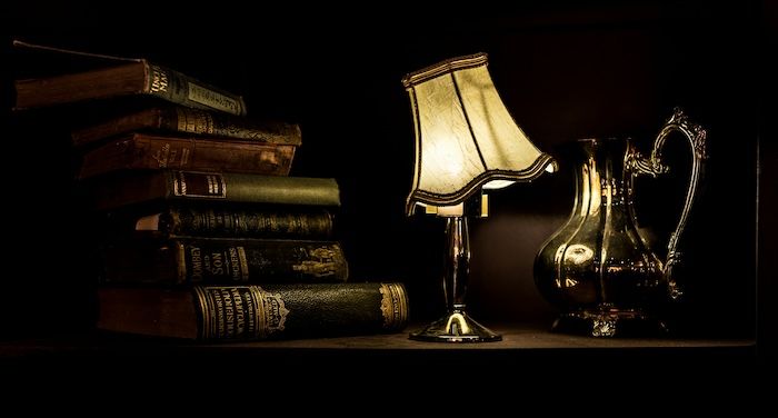 old books with lamp and pitcher.jpg.optimal