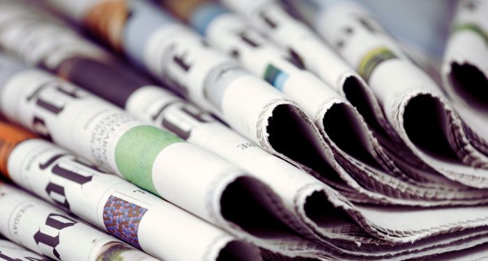 newspapers in loose stack.jpg.optimal